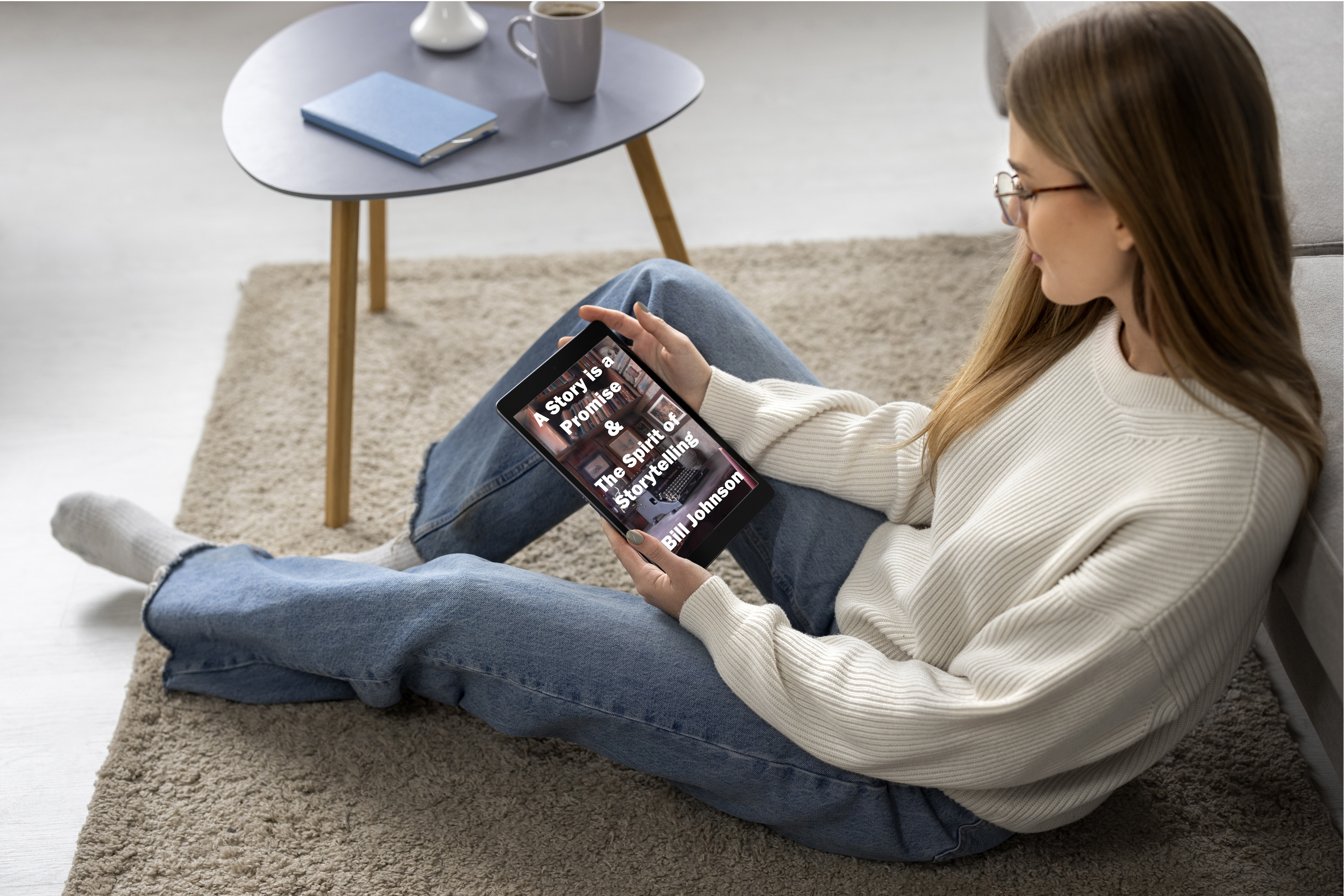 Girl holding cover of A Story is a Promise